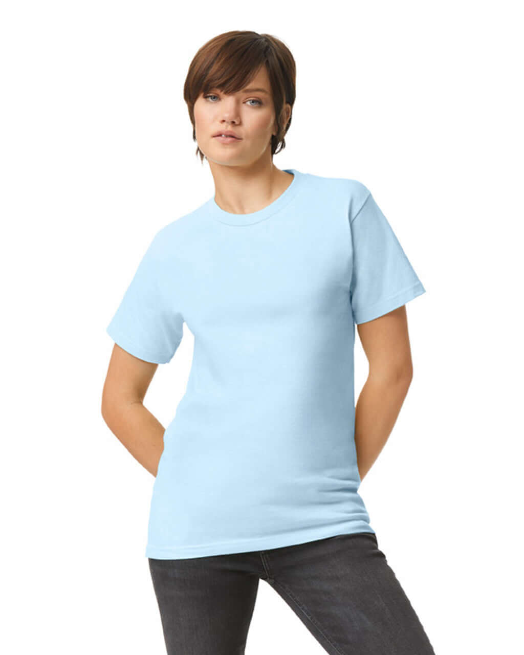 Model wearing a powder blue unisex heavyweight cotton t-shirt, showcasing its versatility and style.
