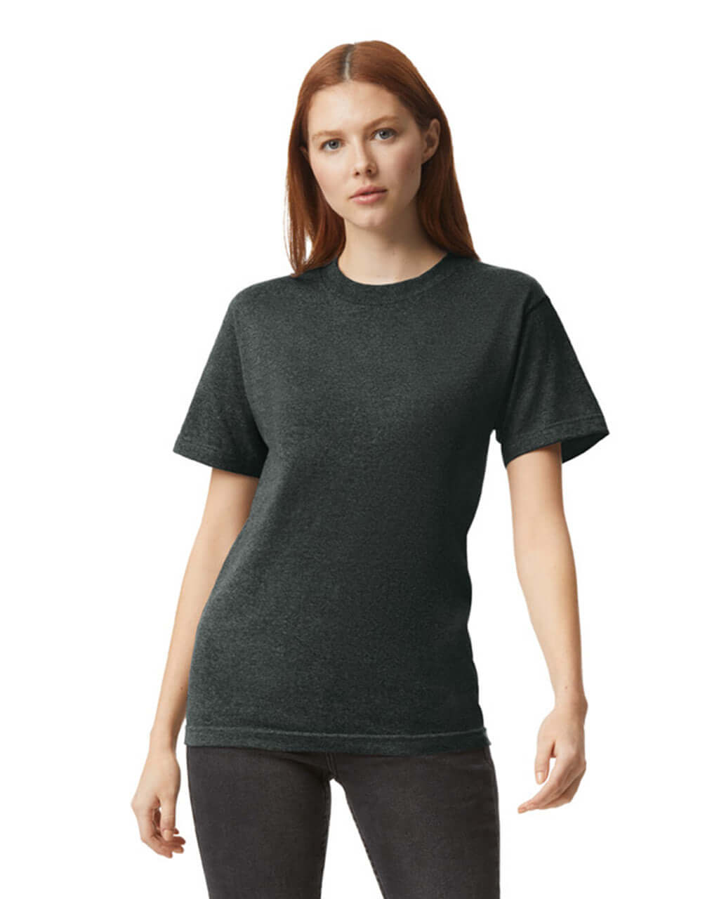 Model wearing a heather charcoal unisex heavyweight cotton t-shirt, showcasing its versatility and style.