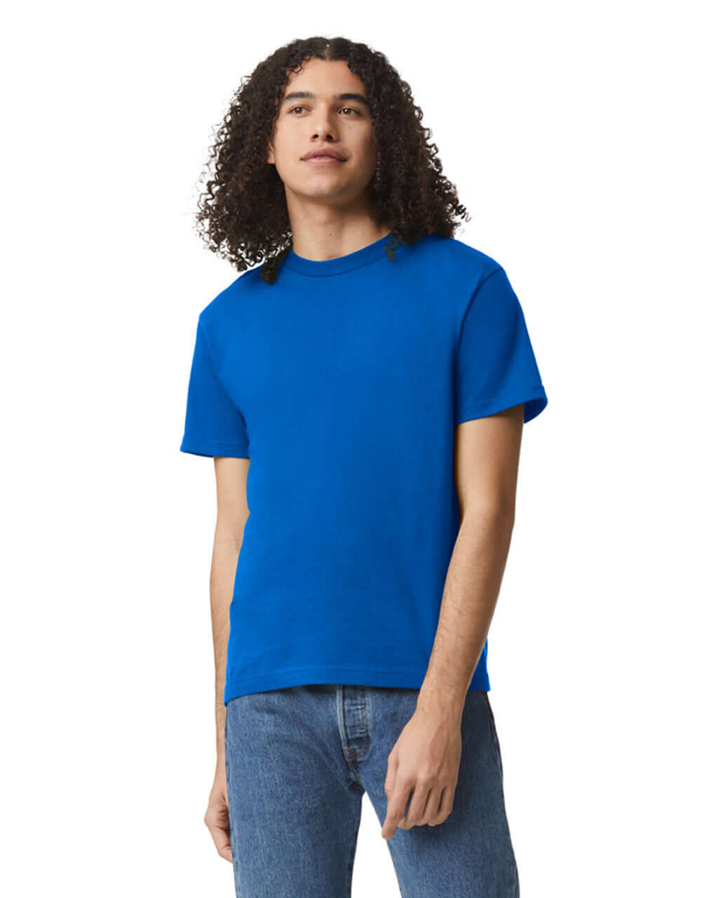 Model wearing a royal blue unisex heavyweight cotton t-shirt, showcasing its versatility and style.