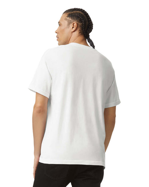 Back view of a male model wearing a white AMERICAN APPAREL unisex heavyweight cotton t-shirt.