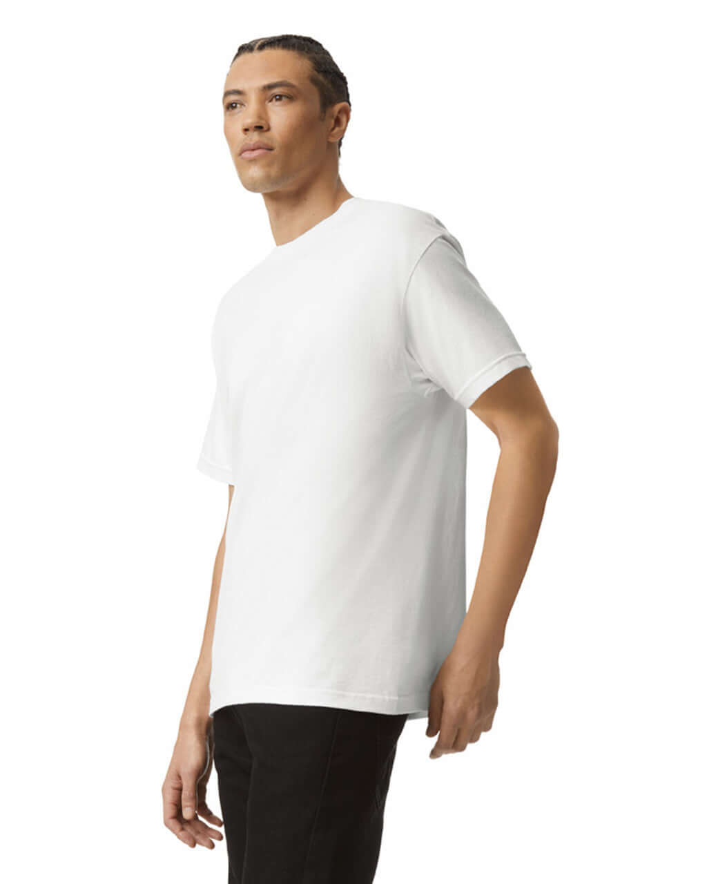 Model showcasing the American Apparel unisex heavyweight cotton t-shirt in white, featuring a relaxed fit and durable fabric.