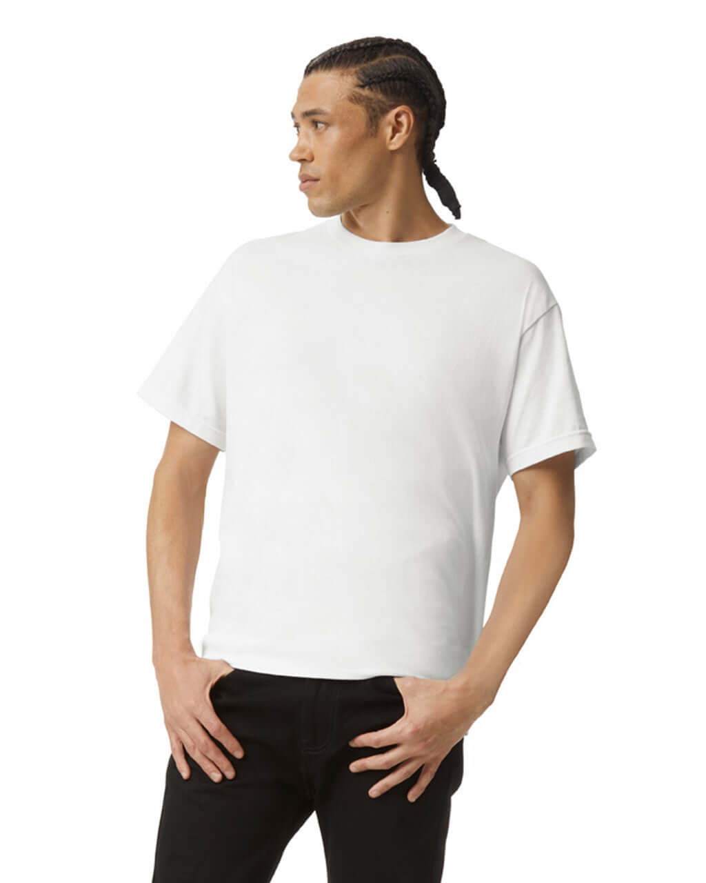Model wearing a white unisex heavyweight cotton t-shirt, showcasing its versatility and style.