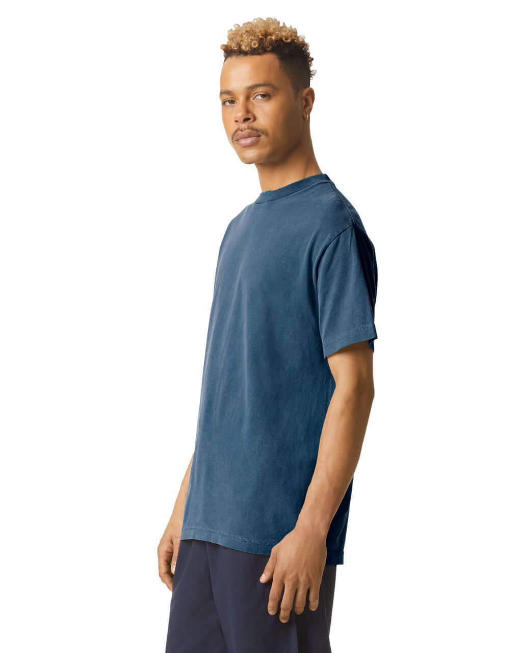 American Apparel heavyweight unisex garment dyed tee in navy, showcasing a soft, comfortable fit and stylish design.