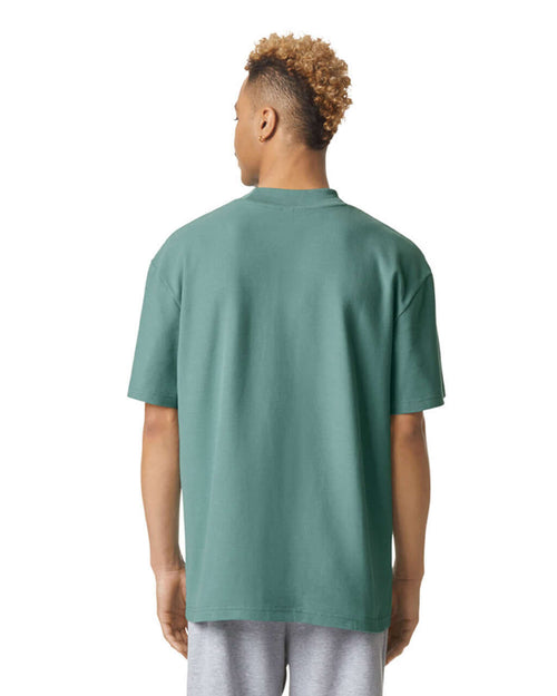 Back view of a man wearing an American Apparel Pique Unisex Mockneck T-Shirt in arctic.