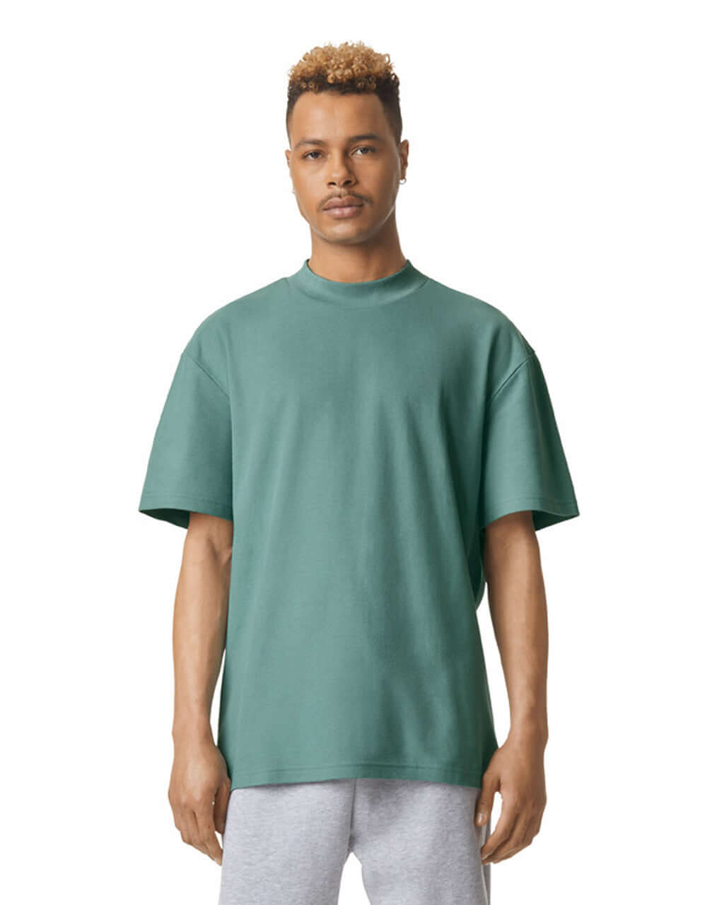 Model wearing American Apparel unisex mockneck t-shirt in arctic, showcasing casual style and comfort.