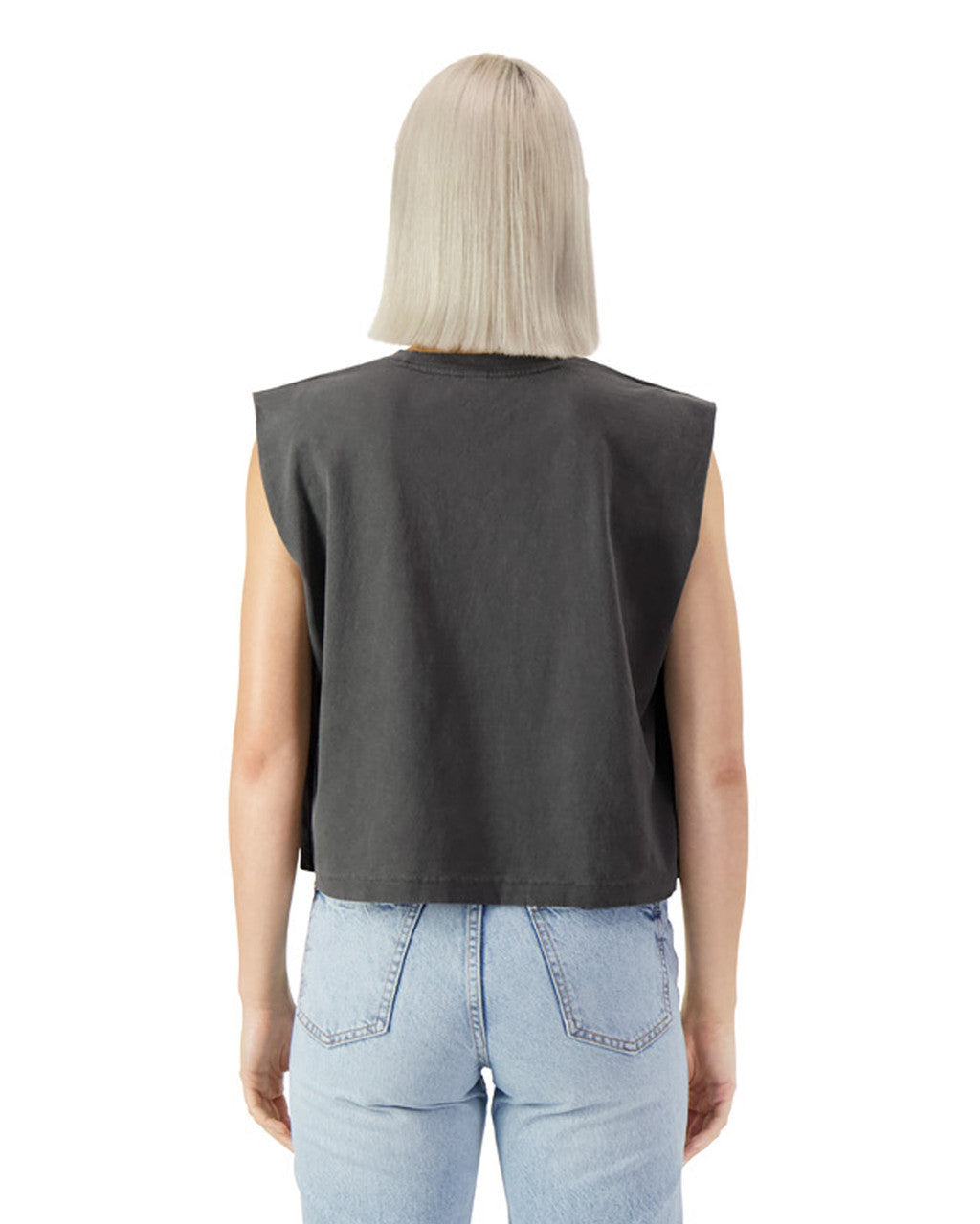 Back view of a model wearing a black heavyweight muscle t-shirt with light blue jeans.