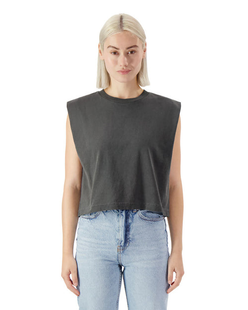 Model wearing AMERICAN APPAREL Heavyweight Garment Dyed Muscle T-Shirt in dark gray, styled with high-waisted jeans.