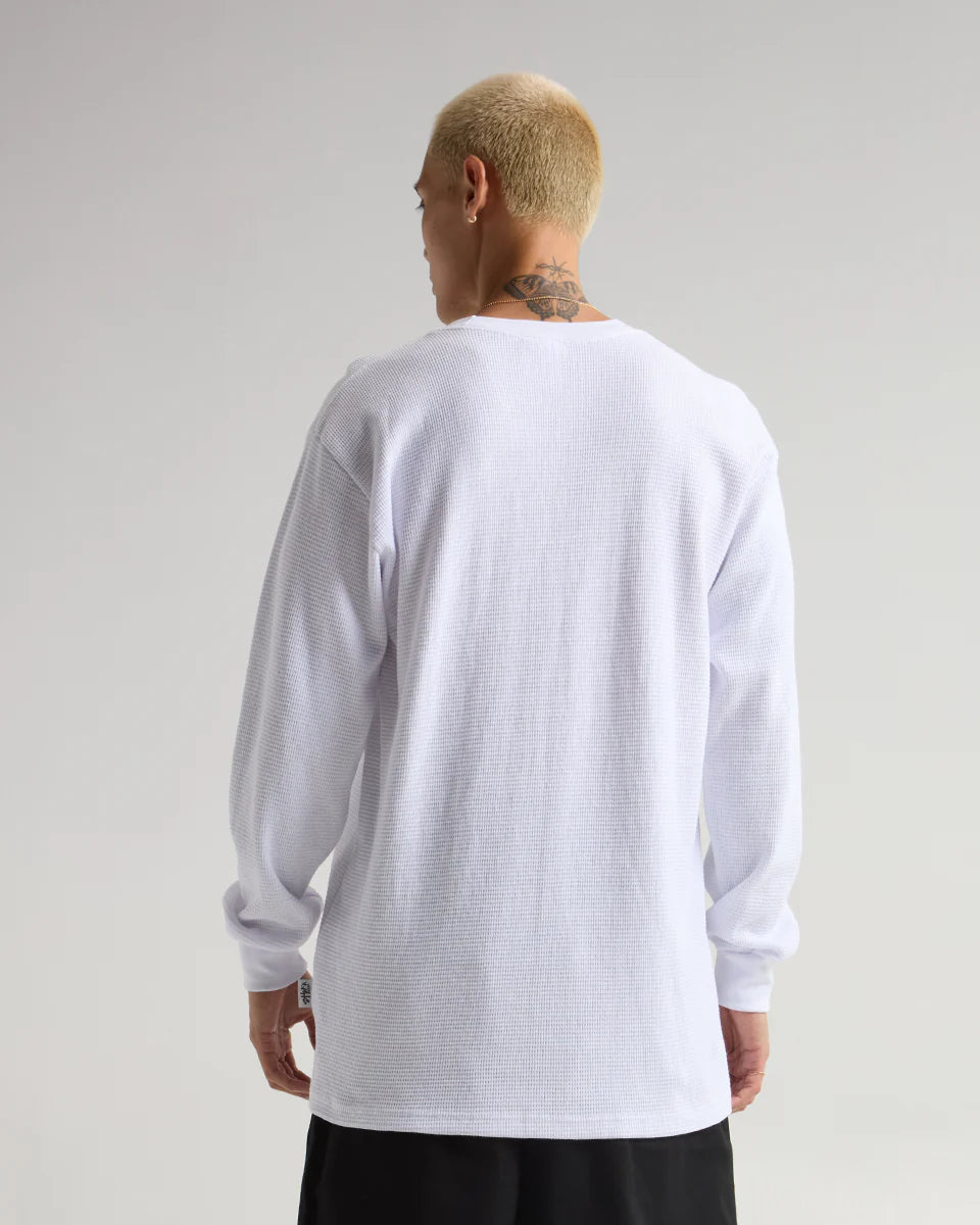 Model wearing a white heavyweight thermal with long sleeves, showcasing its back and relaxed style.