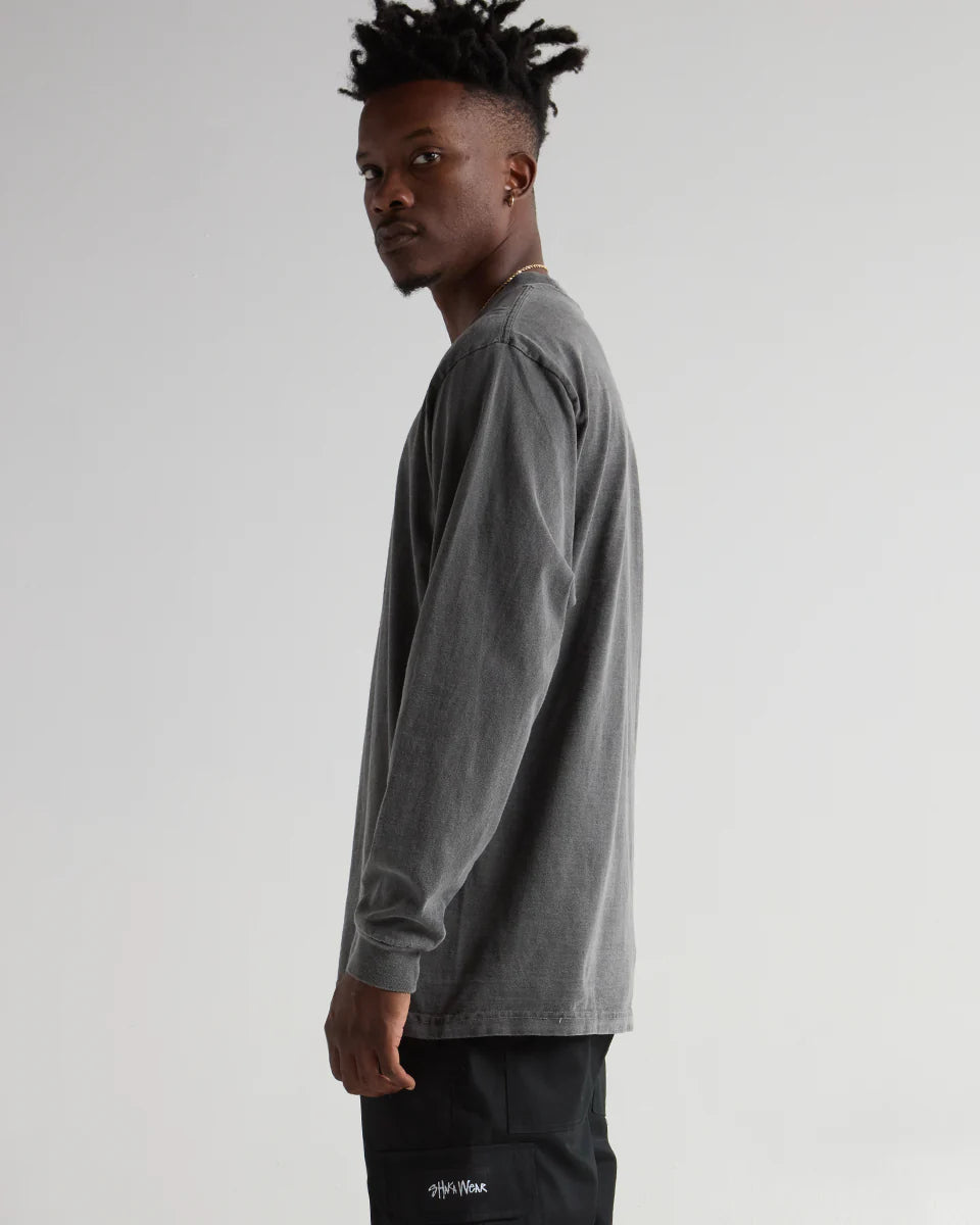Model showcasing the MAX Heavyweight Garment Dye Long Sleeve in washed-out gray, emphasizing streetwear style and durability.