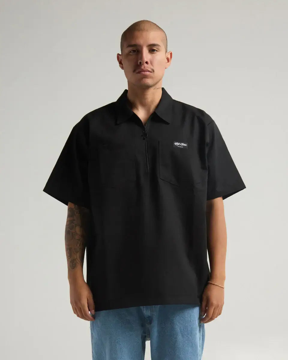 Black SHAKA WEAR WORK SHIRT featuring a front zipper and relaxed fit, ideal for work and casual wear.